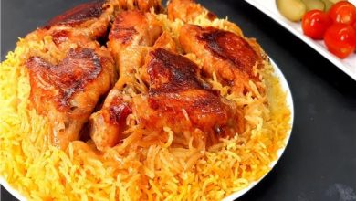 صورة بخطوات بسيطة.. طريقة عمل أجنحة الدجاج المكرملة مع الأرز بالكركم والكاري