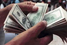 صورة الأجانب يبيعون الدولار للاستثمار في الجنيه.. فما الأسباب؟