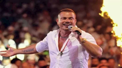 صورة هالاند يستمع لأغنية عمرو دياب مع عمر مرموش (صور)