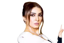 صورة روجينا بإطلالة جديدة باللون الأبيض.. تصميم جذاب يبرز قوامها