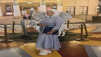 صورة 3 صور لزوجة محمد النني الأولى مع أبنائهما