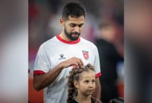 صورة | علي علوان يخطف الأنظار في لقطة جميلة مع طفلة روسية قبيل مباراة الأردن وروسيا