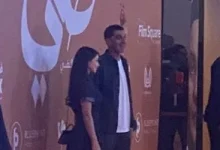 صورة كريم الشناوي وأسِيل عمران يتواجدان في العرض الخاص لفيلم «ضي»